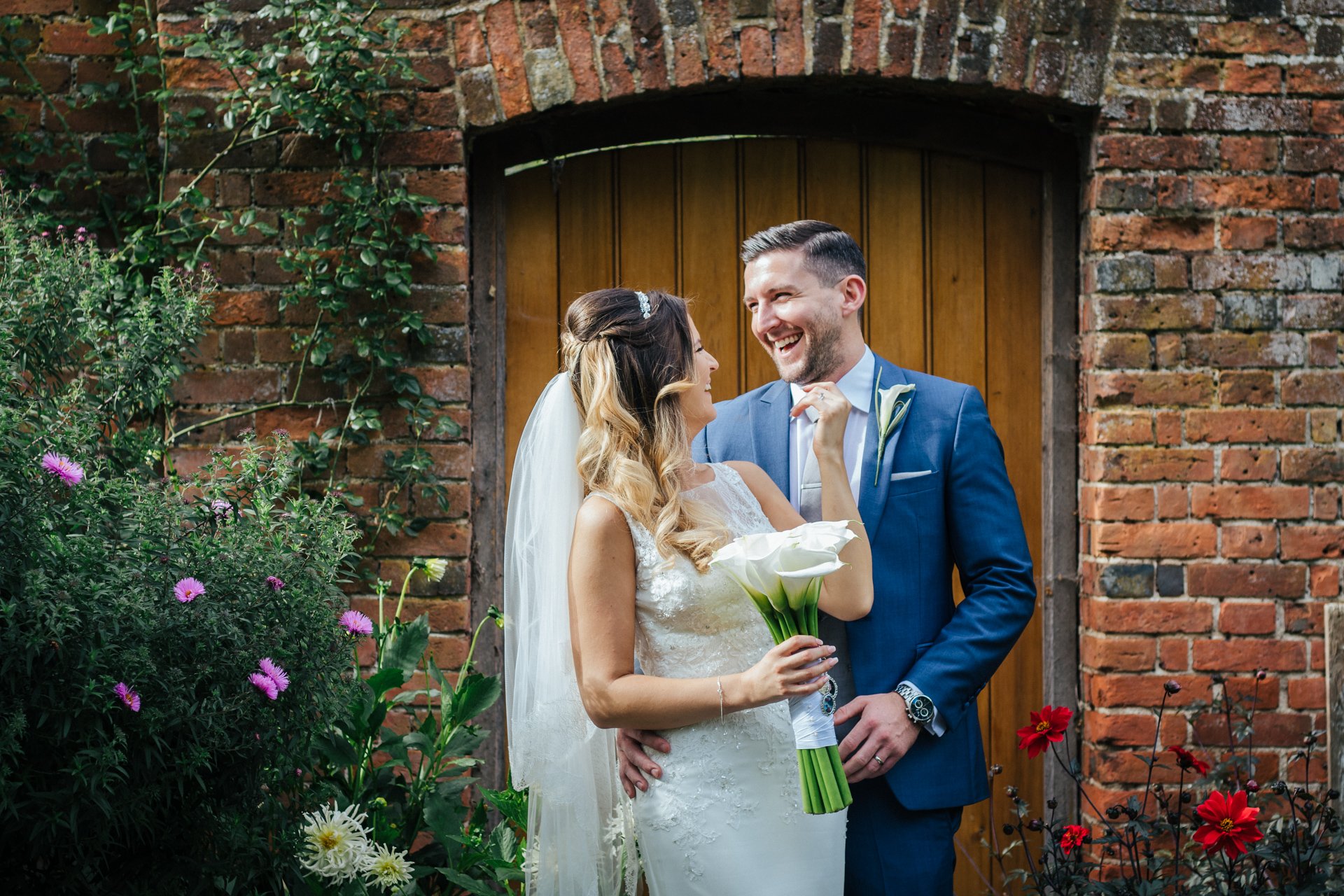 Smiling, relaxed couple on their wedding day, at Blake Hall, Wedding Photography Kent