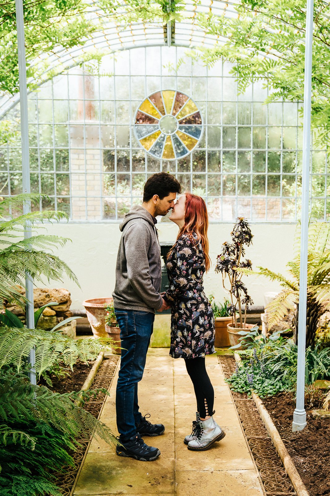 Couple kissing in the grotto and fernery at Swiss Gardens Couple shoot