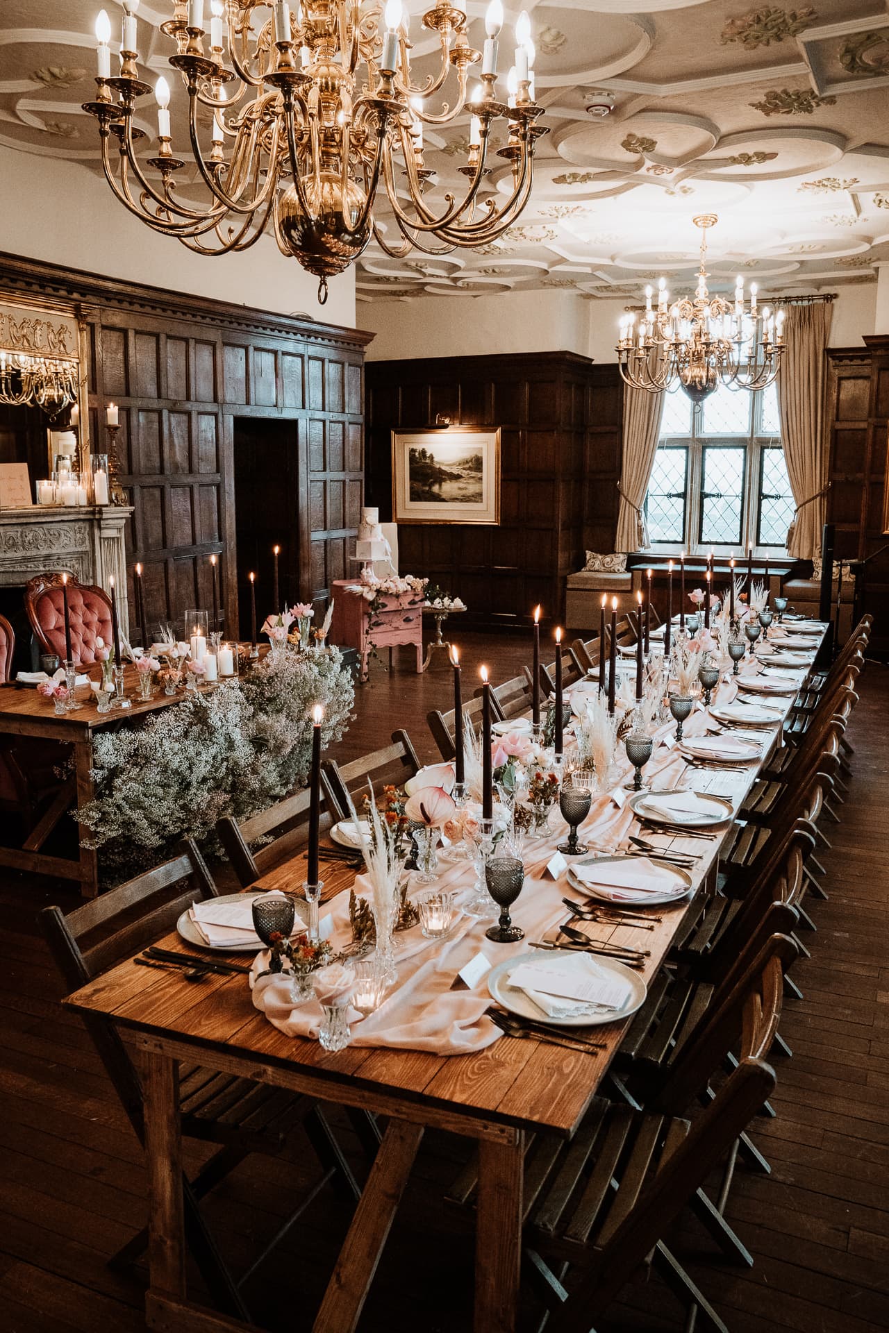 Grand Wedding breakfast set up on long tables in Eastwell Manor Kent