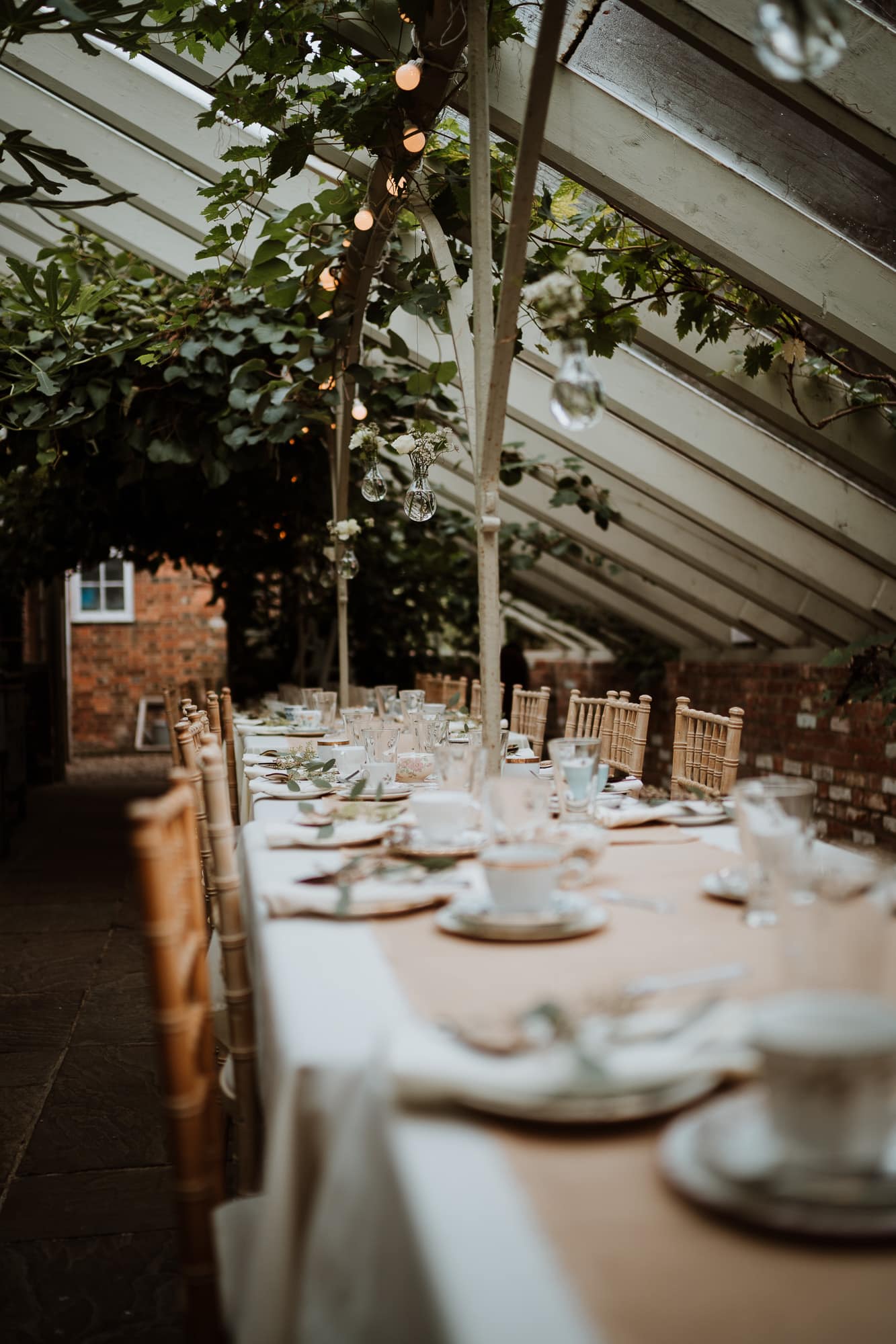 The Glasshouse in The Secret Garden dressed for an intimate afternoon tea wedding breakfast