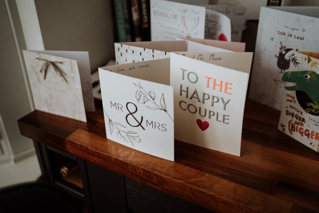 Greeting cards of congratulations to the happy couple on display during bridal preparations