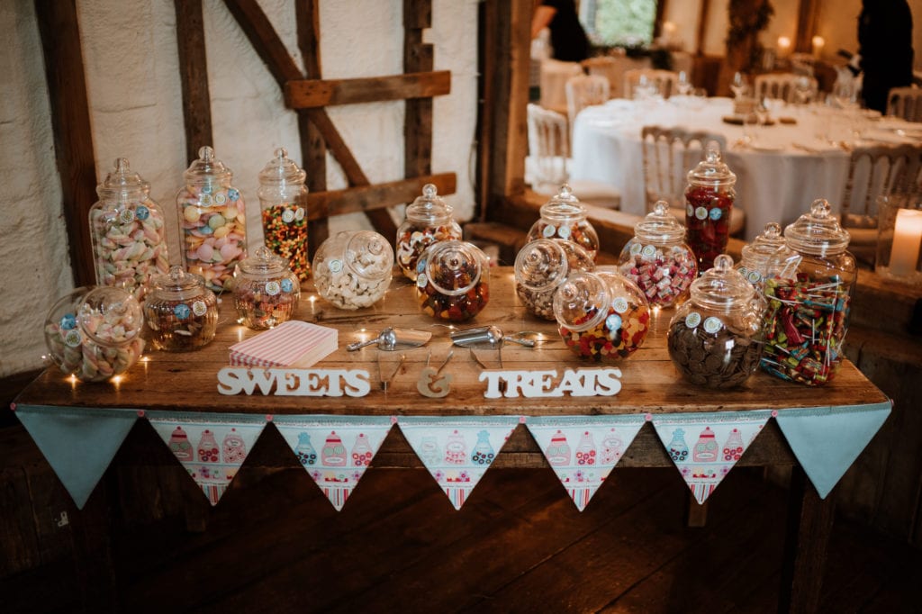 Wooden table adorned with sweets