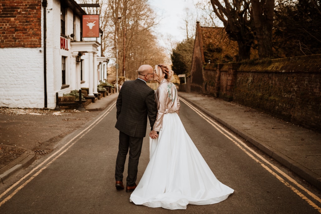 The couple standing outside of Buttery and Glasshouse in Wrotham which is a wedding venue in Kent