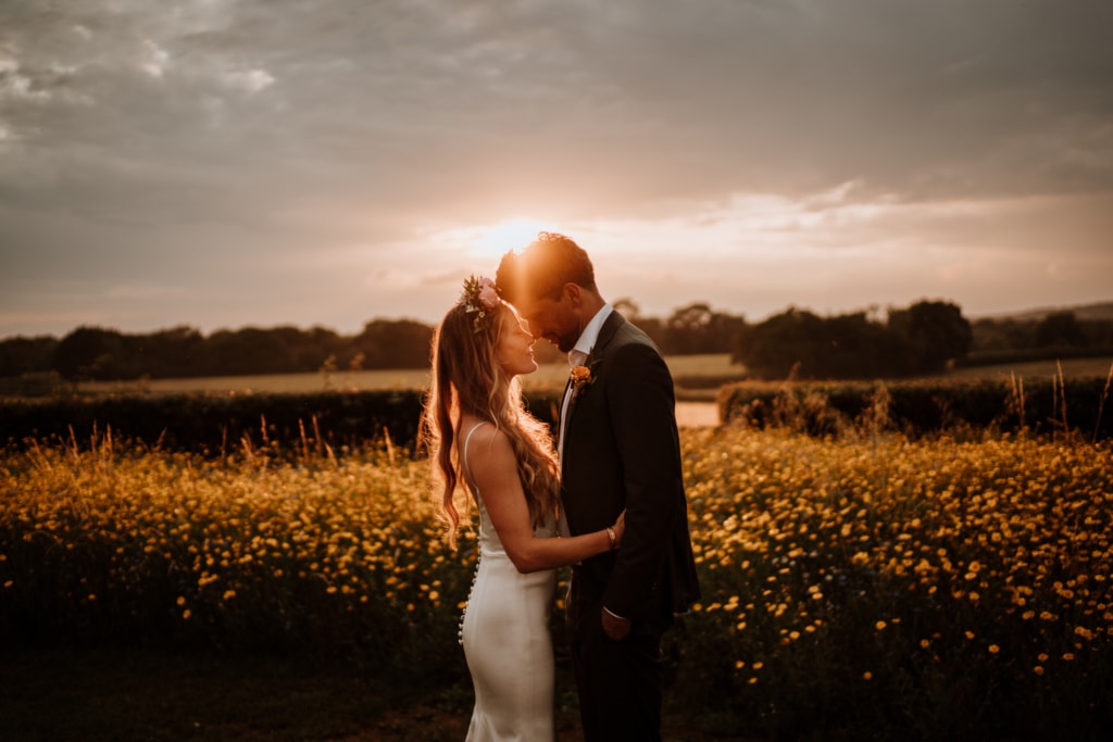 Couples portraits at sunset that were scheduled into their wedding day timeline