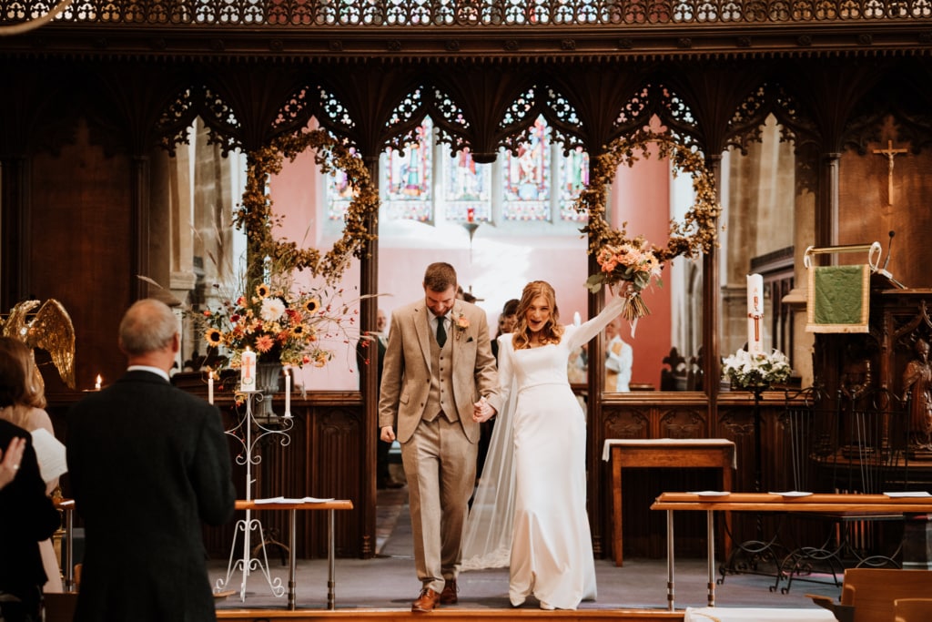 Couple during their wedding ceremony captured by a wedding photographer in Kent