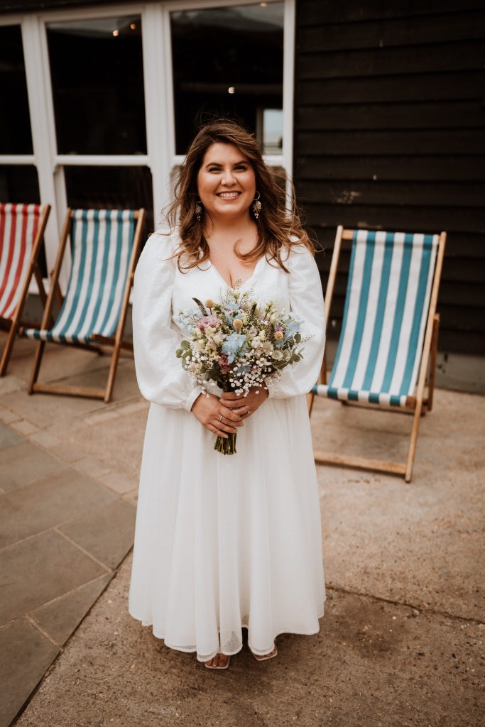 Claire and Samirs wedding ceremony at East Quay in Whitstable